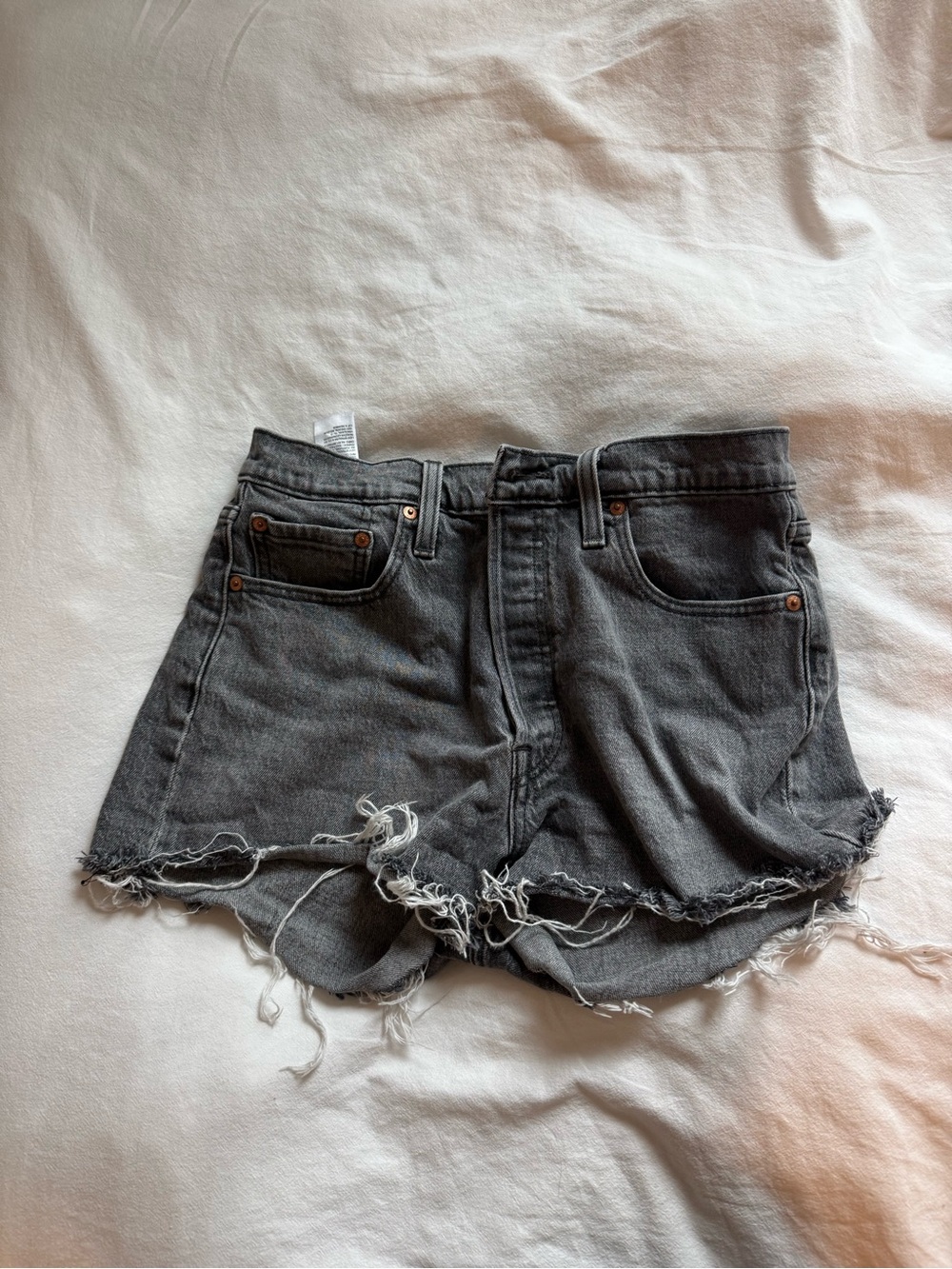 Levi’s 501 Washed Black Denim Cutoff Shorts